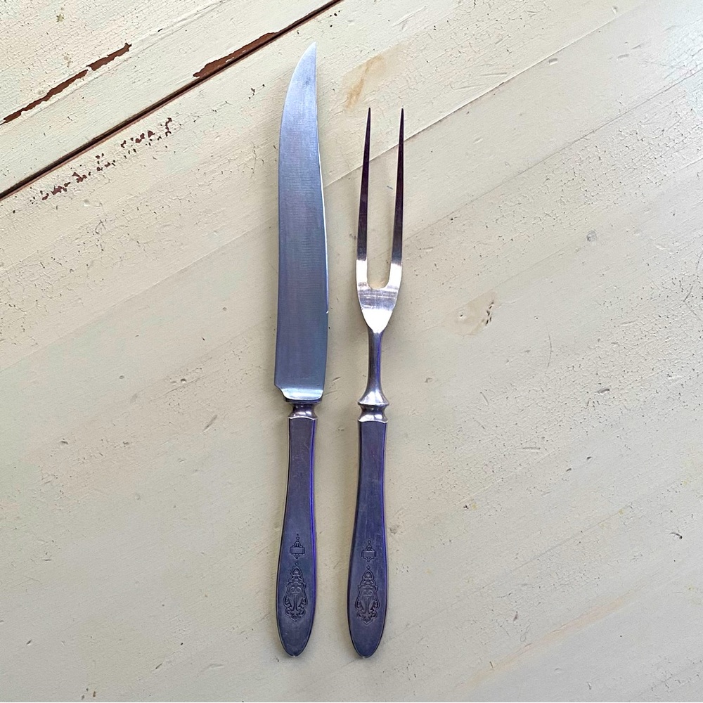 Antique Bird of Paradise 2 piece carving set, 1923